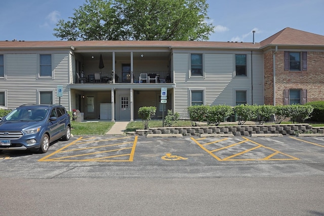 1700 Fayette Walk Unit E, Hoffman Estates, IL 60195 - view of property featuring uncovered parking