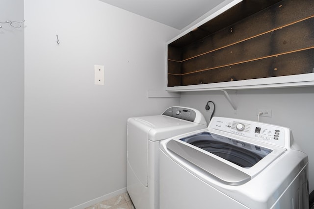 1700 Fayette Walk Unit E, Hoffman Estates, IL 60195 - washroom featuring washer and dryer and baseboards