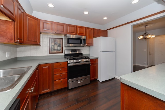 1700 Fayette Walk Unit E, Hoffman Estates, IL 60195 - kitchen featuring stainless steel appliances, dark wood-type flooring, a chandelier, tasteful backsplash, and recessed lighting