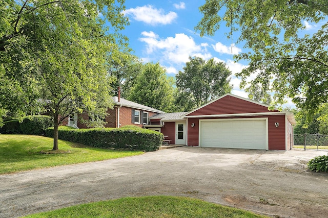 25725 S Old Monee Steger Rd, Monee, IL 60449 - split level home featuring a garage and asphalt driveway