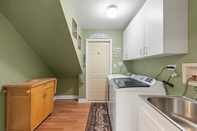 573 Surryse Rd, Lake Zurich, IL 60047 - laundry area featuring cabinet space, independent washer and dryer, and light wood-style floors