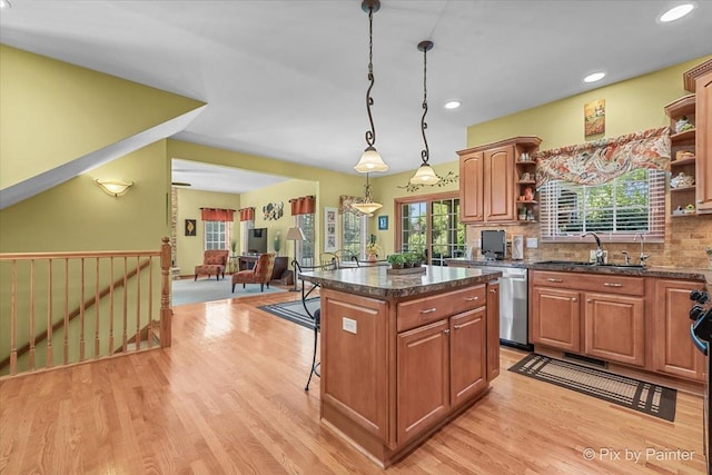 3720 Cypress Dr, Spring Grove, IL 60081 - kitchen with open shelves, dishwasher, a kitchen island, light wood finished floors, and decorative light fixtures