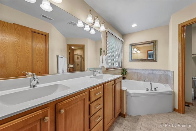 3720 Cypress Dr, Spring Grove, IL 60081 - bathroom featuring double vanity, a garden tub, tile patterned floors, and an enclosed shower