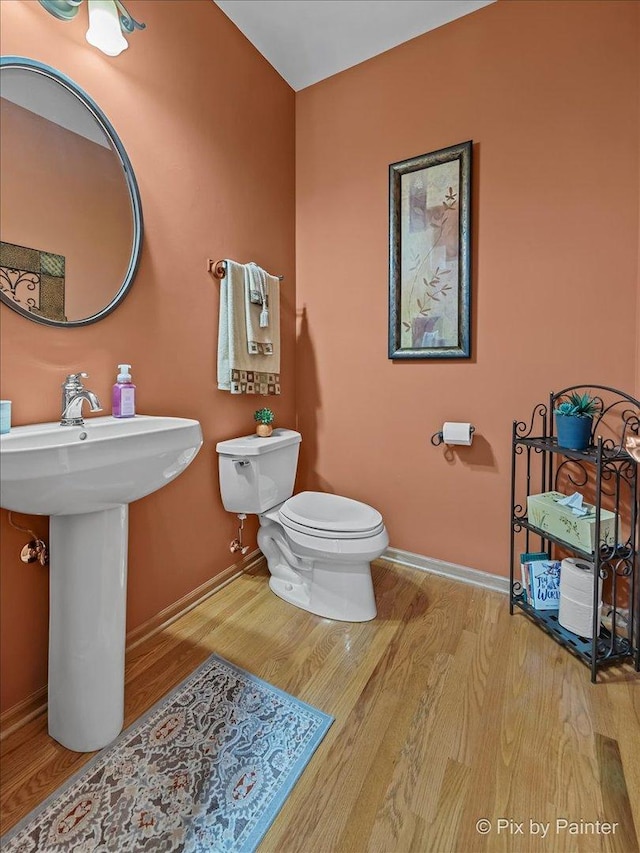 3720 Cypress Dr, Spring Grove, IL 60081 - half bath with toilet and wood finished floors