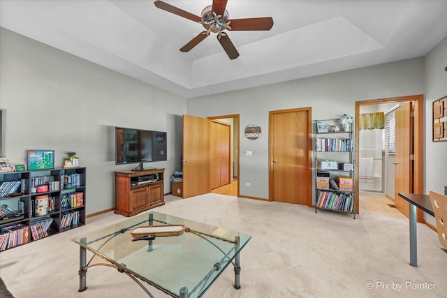 3720 Cypress Dr, Spring Grove, IL 60081 - living room featuring light colored carpet, a tray ceiling, and ceiling fan