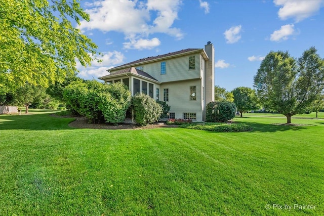 3720 Cypress Dr, Spring Grove, IL 60081 - rear view of property featuring a chimney and a yard