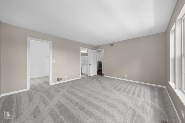 2673 N Greenwood Ave, Arlington Heights, IL 60004 - unfurnished bedroom featuring a spacious closet, carpet floors, a closet, and connected bathroom