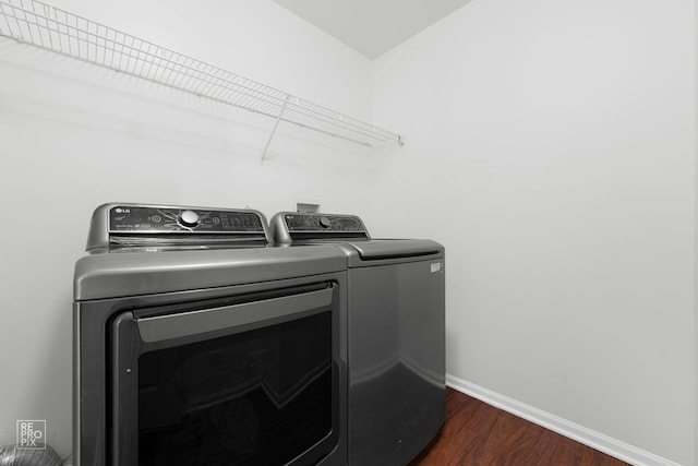 2673 N Greenwood Ave, Arlington Heights, IL 60004 - laundry area with washing machine and clothes dryer and dark wood-style flooring