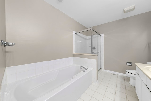 2673 N Greenwood Ave, Arlington Heights, IL 60004 - bathroom featuring vanity, a garden tub, a shower stall, and tile patterned flooring