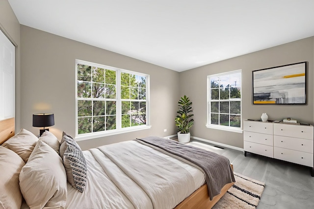 2673 N Greenwood Ave, Arlington Heights, IL 60004 - bedroom with wood finished floors and baseboards