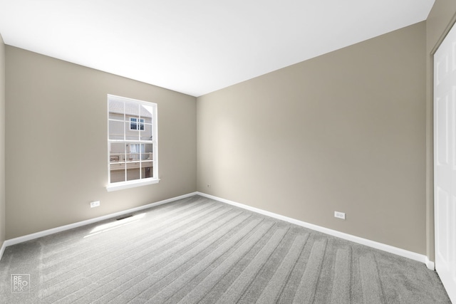 2673 N Greenwood Ave, Arlington Heights, IL 60004 - carpeted spare room featuring baseboards