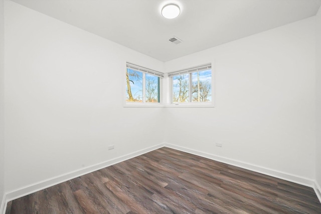 12629 S Throop St, Calumet Park, IL 60827 - unfurnished room with dark wood-style floors and baseboards