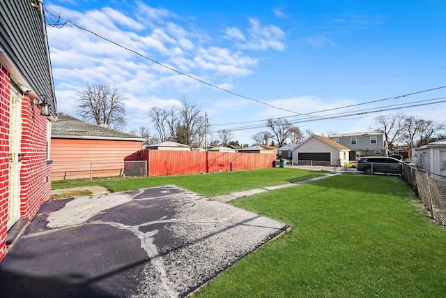 12629 S Throop St, Calumet Park, IL 60827 - view of yard featuring a garage