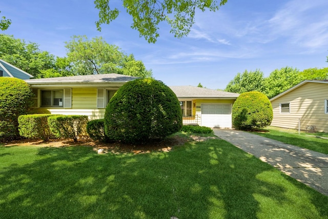 184 Kathleen Dr, Elgin, IL 60123 - single story home with concrete driveway, a garage, and a front yard
