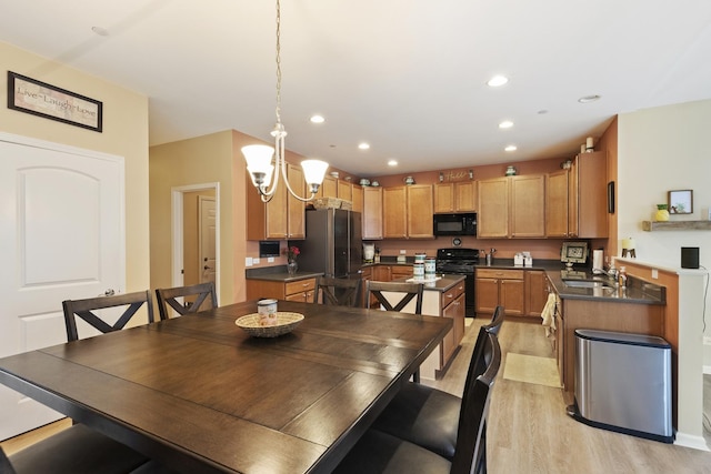 60 Linden Rd, Lake Zurich, IL 60047 - dining space with light wood-style floors, a chandelier, and recessed lighting