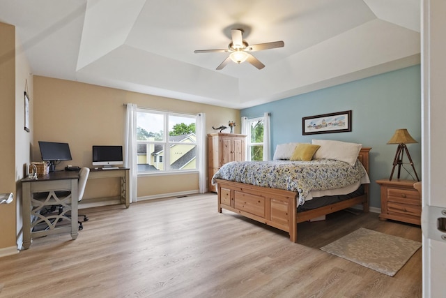 60 Linden Rd, Lake Zurich, IL 60047 - bedroom with a tray ceiling, a desk, wood finished floors, and a ceiling fan
