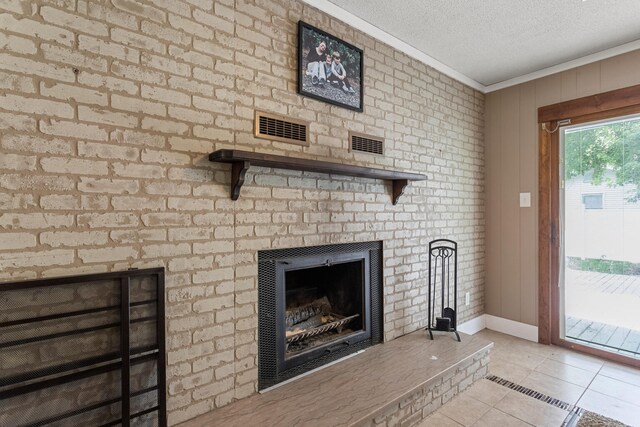 103 Taylor Ct, Catlin, IL 61817 - detailed view of crown molding, a fireplace, and a textured ceiling