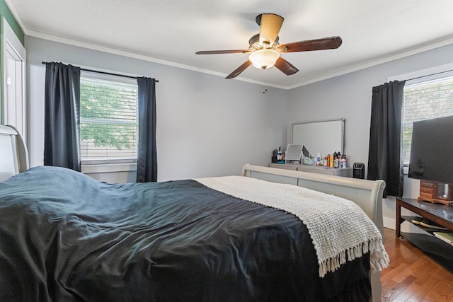 103 Taylor Ct, Catlin, IL 61817 - bedroom with wood finished floors, multiple windows, crown molding, and a ceiling fan