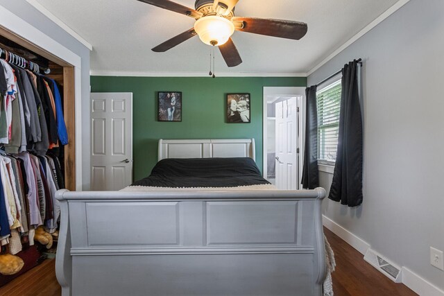 103 Taylor Ct, Catlin, IL 61817 - bedroom featuring dark wood-type flooring, crown molding, ceiling fan, and a closet
