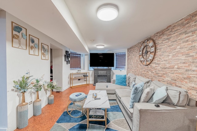 3605 W Cermak Rd, Chicago, IL 60623 - living room featuring a fireplace and brick wall