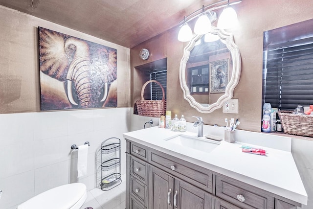 3605 W Cermak Rd, Chicago, IL 60623 - bathroom with vanity and tile walls