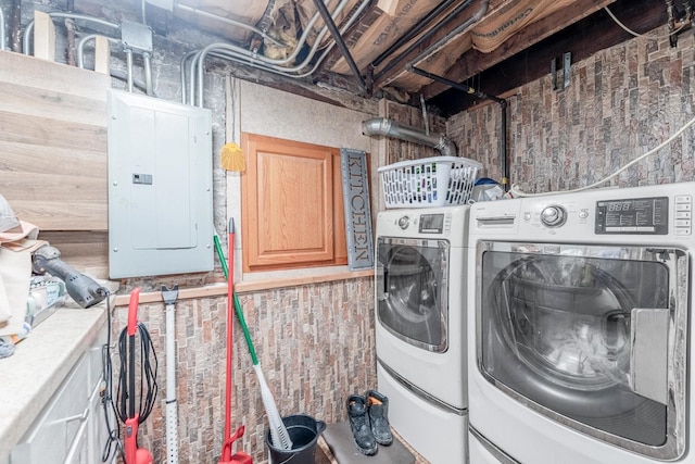 3605 W Cermak Rd, Chicago, IL 60623 - laundry area with electric panel and washer and clothes dryer