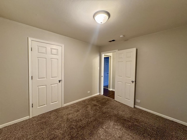 3732 153rd St, Midlothian, IL 60445 - unfurnished bedroom featuring dark colored carpet and baseboards