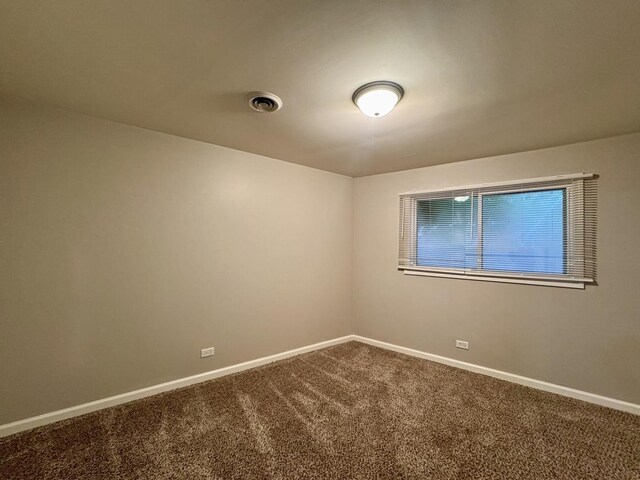 3732 153rd St, Midlothian, IL 60445 - unfurnished room featuring dark carpet and baseboards