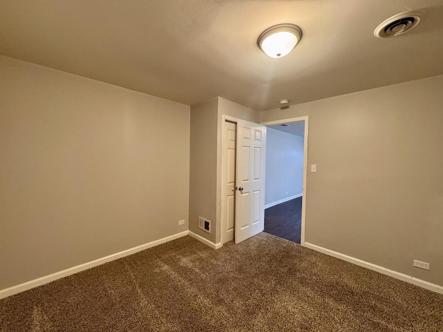 3732 153rd St, Midlothian, IL 60445 - empty room featuring dark colored carpet and baseboards