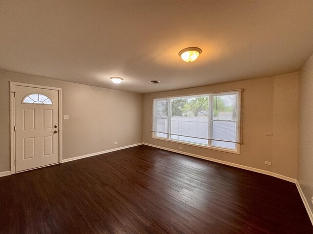 3732 153rd St, Midlothian, IL 60445 - entryway with baseboards and dark wood-type flooring