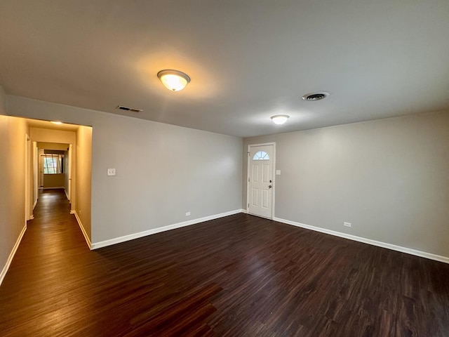 3732 153rd St, Midlothian, IL 60445 - spare room with baseboards and dark wood-style flooring