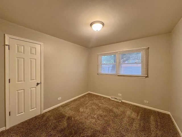 3732 153rd St, Midlothian, IL 60445 - empty room with dark colored carpet and baseboards