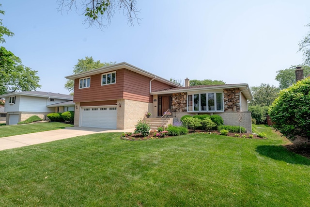 769 S Stuart Ave, Elmhurst, IL 60126 - split level home with a chimney, concrete driveway, brick siding, a garage, and a front lawn