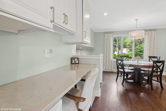769 S Stuart Ave, Elmhurst, IL 60126 - kitchen featuring crown molding, dark wood-style flooring, white cabinetry, decorative light fixtures, and recessed lighting