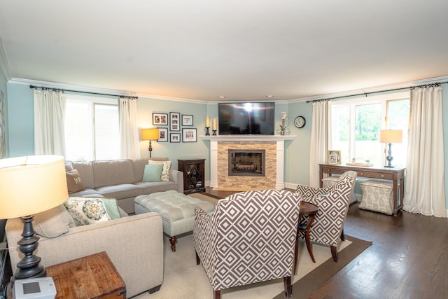 769 S Stuart Ave, Elmhurst, IL 60126 - living room with crown molding, dark wood-style flooring, and a fireplace