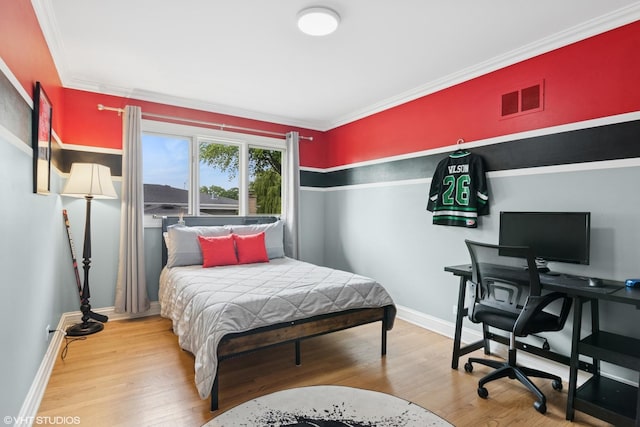 769 S Stuart Ave, Elmhurst, IL 60126 - bedroom featuring wood finished floors, ornamental molding, and an office area