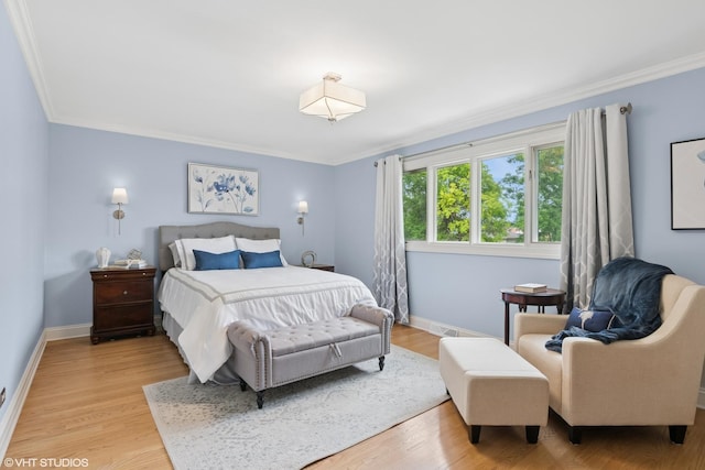 769 S Stuart Ave, Elmhurst, IL 60126 - bedroom featuring ornamental molding and light wood finished floors