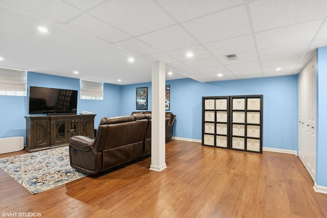 769 S Stuart Ave, Elmhurst, IL 60126 - living area featuring wood finished floors, a paneled ceiling, and recessed lighting