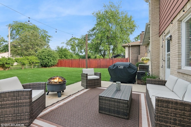 769 S Stuart Ave, Elmhurst, IL 60126 - fenced backyard with an outdoor living space with a fire pit, grilling area, and a patio