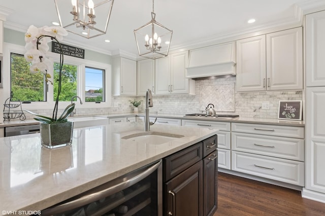 769 S Stuart Ave, Elmhurst, IL 60126 - kitchen with a chandelier, white cabinetry, wine cooler, crown molding, and decorative backsplash