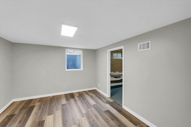 1211 Garden Ln, Champaign, IL 61820 - spare room featuring wood finished floors