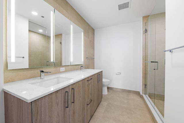 211 N Harbor Dr Unit 1601, Chicago, IL 60601 - bathroom featuring double vanity, a stall shower, and recessed lighting