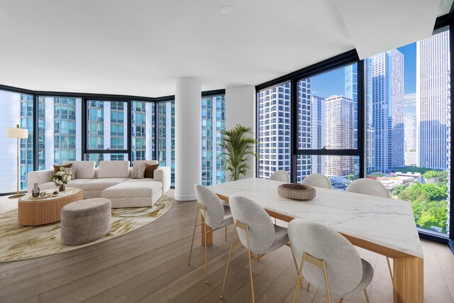 211 N Harbor Dr Unit 1601, Chicago, IL 60601 - dining space featuring floor to ceiling windows and wood finished floors