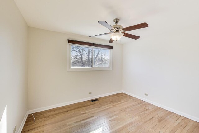 2023 N Shenandoah Dr, Arlington Heights, IL 60004 - spare room with light wood-type flooring and a ceiling fan