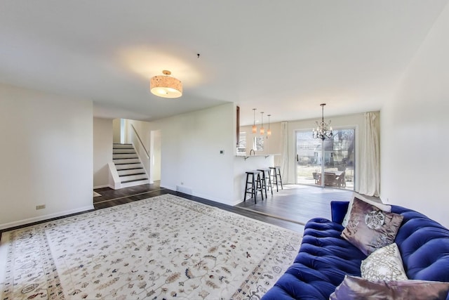 2023 N Shenandoah Dr, Arlington Heights, IL 60004 - living area with stairs, a chandelier, and wood finished floors