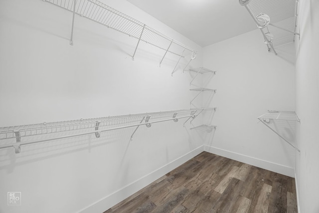 6158 S Austin Ave, Chicago, IL 60638 - walk in closet featuring dark wood-style flooring