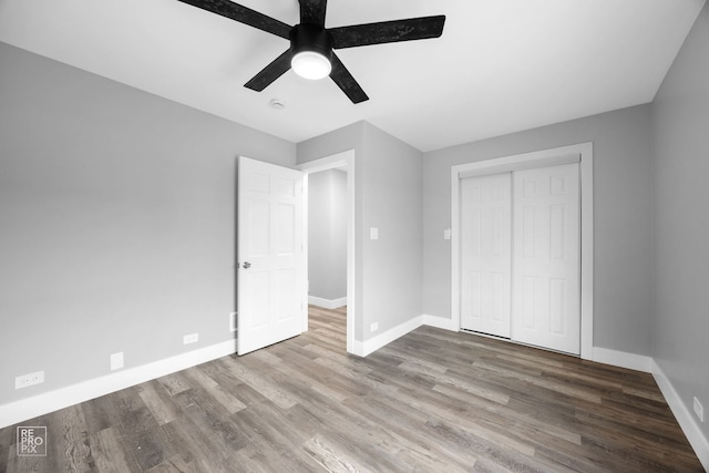 6158 S Austin Ave, Chicago, IL 60638 - unfurnished bedroom featuring wood finished floors, a closet, and a ceiling fan