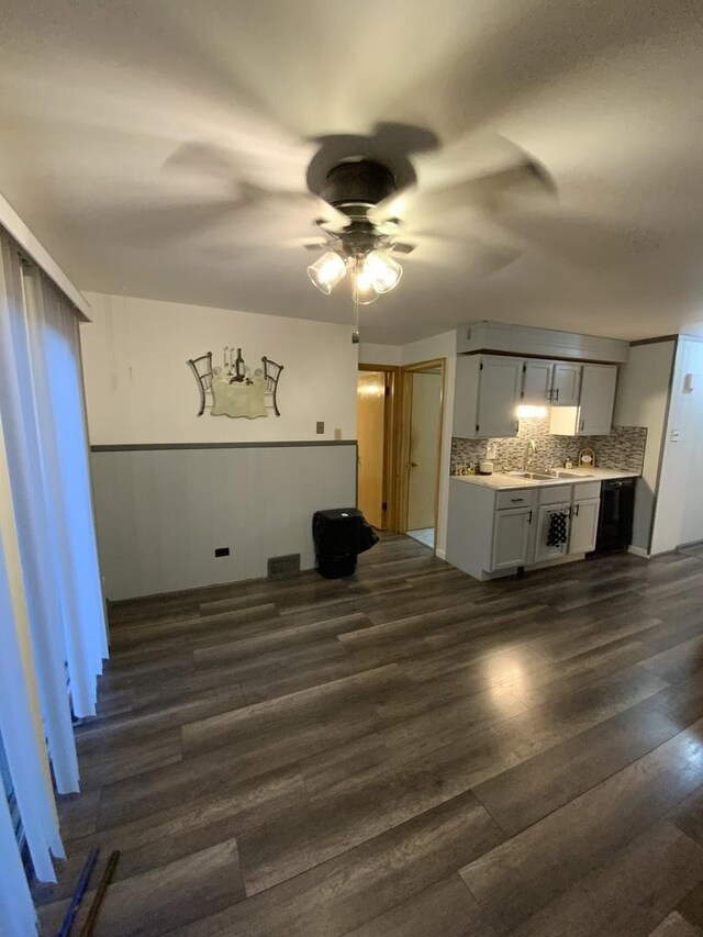 14441 Dante Ave, Dolton, IL 60419 - unfurnished living room with ceiling fan, dark wood-type flooring, and wainscoting