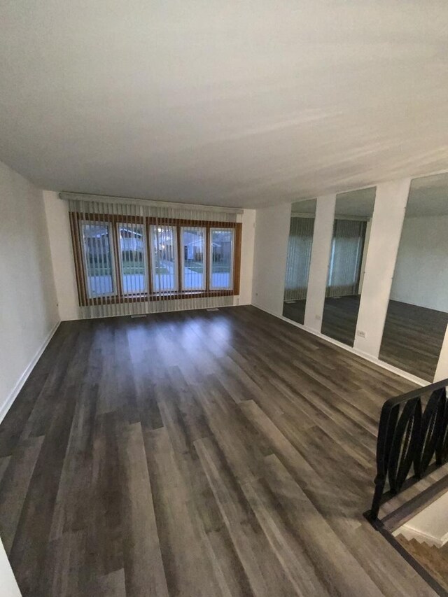 14441 Dante Ave, Dolton, IL 60419 - unfurnished room with dark wood finished floors