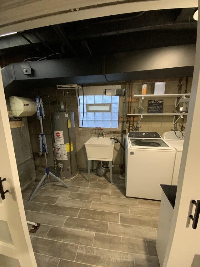 14441 Dante Ave, Dolton, IL 60419 - laundry room with gas water heater, washer and dryer, and wood finish floors